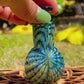 Experimental Green Vials